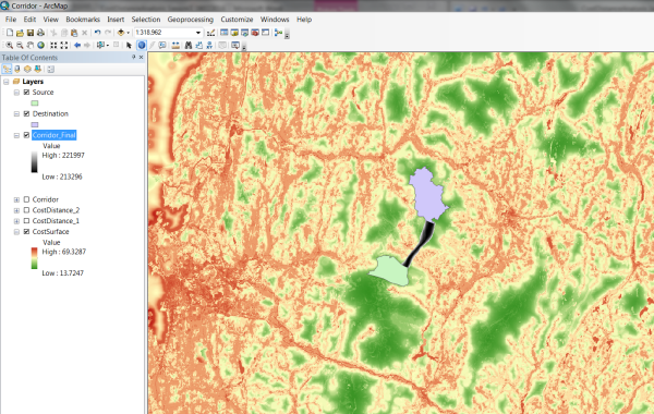 Resulting corridor from Extract by Attribute displayed with Source and Destination over the cost surface