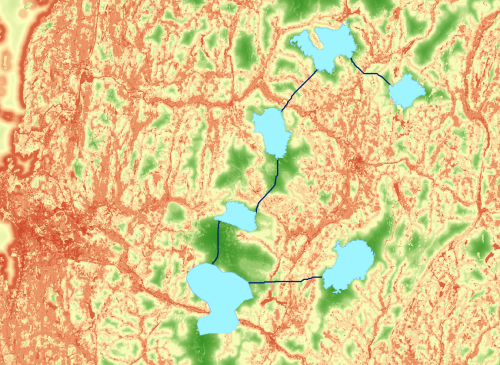 Bobcat habitat patches connected with the optimum corridor network of paths displayed over the cost surface