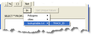 Clicking the In button on Tracking Analyst's enhanced version of the Query Builder dialog box expands a list of lookup tables and the fields contained within them