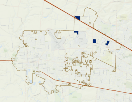 Map of four lots within a mile of a highway